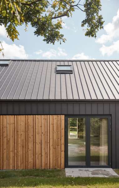 Tilbygning i stål og træ skaber ekstra plads til ”udlån” på Risskov Bibliotek, Risskov Bibliotek - Fortebakken 1, 8240 Risskov